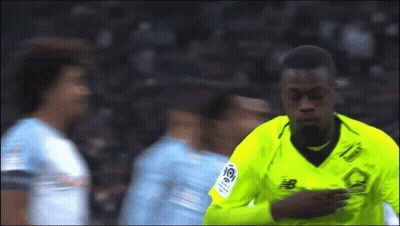 Soccer Player In Yellow Jersey With Letter B GIF