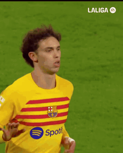 Soccer Player In Yellow Jersey With Spotify GIF