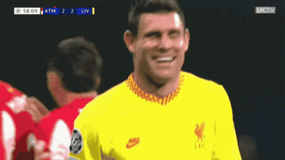Soccer Player In Yellow Nike Jersey Smiling GIF