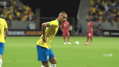 Soccer Player In Yellow Shirt And Blue Shorts GIF