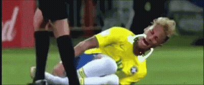 Soccer Player In Yellow Shirt Laying On Field GIF