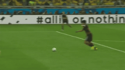 Soccer Player In Yellow Shirt Running Towards Adidas Goal GIF