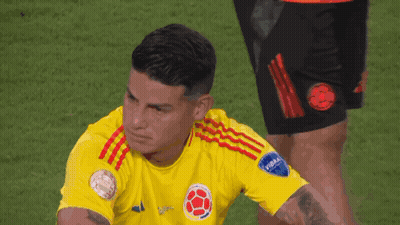 Soccer Player In Yellow Shirt Saying FIFA GIF