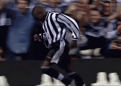 Soccer Player Jumping In Black And White Jersey GIF
