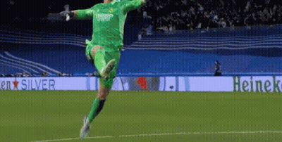 Soccer Player Jumping In Front Of Heineken Banner GIF