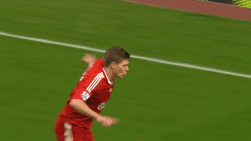 Soccer Player Jumping In Red Jersey GIF