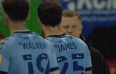 Soccer Player Jumping In The Air On Field GIF