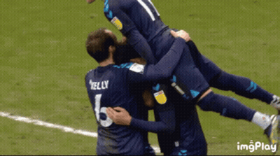 Soccer Player Kelly Jersey Lifted By Teammates GIF