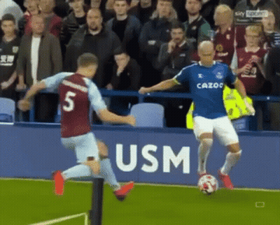 Soccer Player Kicking Ball In Blue Cazoo Shirt GIF