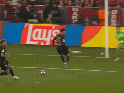 Soccer Player Kicking Ball In Front Of Lays Ad GIF