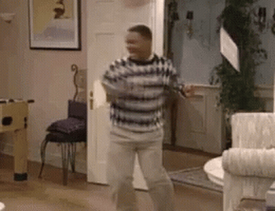 Soccer Player Kicking Ball In Front Of Live And Free Sign GIF