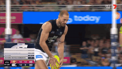 Soccer Player Kicking Ball In Front Of Live And Free Sign GIF