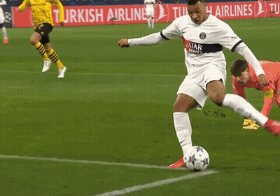 Soccer Player Kicking Ball In Front Of Turkish Airlines Sign GIF