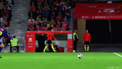 Soccer Player Kicking Ball In Front Of Wanda Metropolitan Banner GIF
