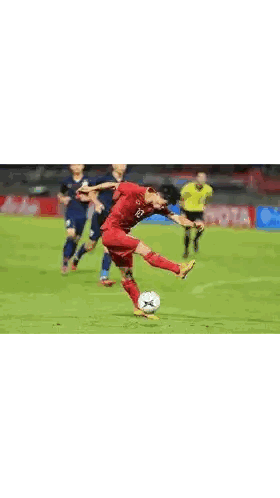 Soccer Player Kicking Ball In Red Sticker