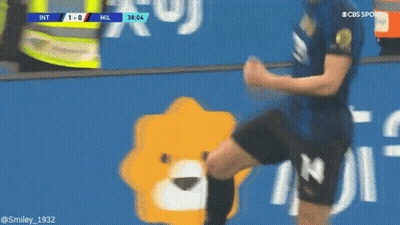 Soccer Player Kicking Ball Near Mil Sign GIF
