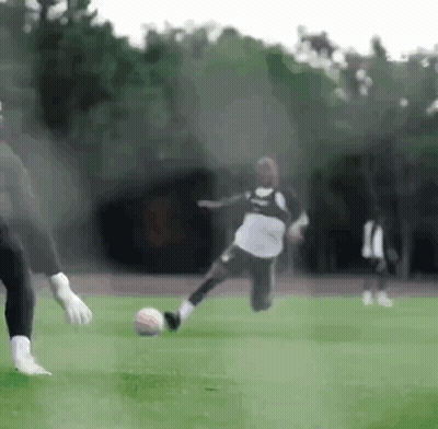 Soccer Player Kicking Ball GIF