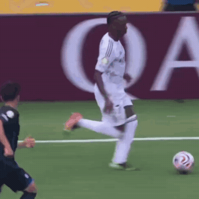 Soccer Player Kicking Ball With QA Sign GIF