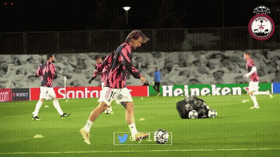 Soccer Player Kicks Ball Heineken Sign GIF