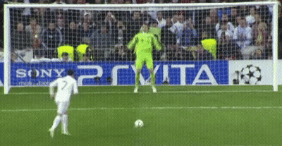 Soccer Player Kicks Ball In Front Of Sony PS Vita Ad GIF