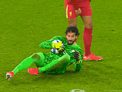 Soccer Player Kneeling Holding Ball GIF