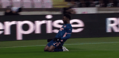 Soccer Player Kneeling In Front Of Sign GIF