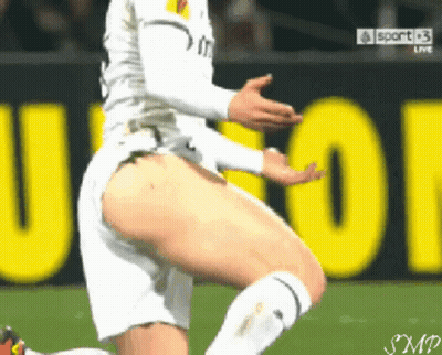 Soccer Player Kneeling In Front Of Sport Sign GIF