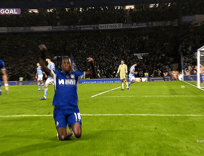 Soccer Player Kneeling On Field By Goal GIF