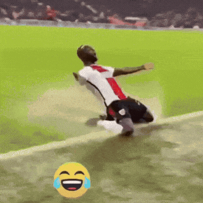 Soccer Player Kneeling With Laughing Smiley Face GIF