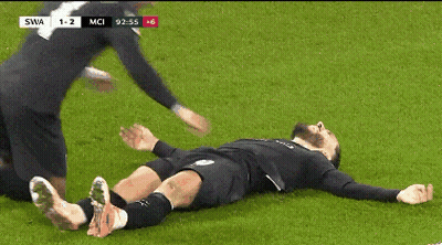 Soccer Player Laying On Field GIF