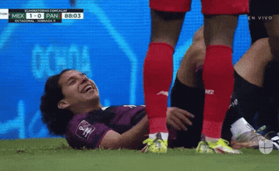 Soccer Player Laying On Field Score 1-0 GIF