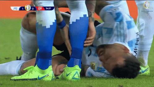 Soccer Player Laying On Ground ARG Vs GM GIF