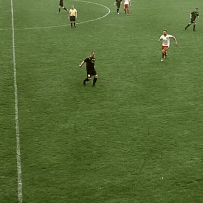 Soccer Player Laying On Ground With Flaming Knee GIF
