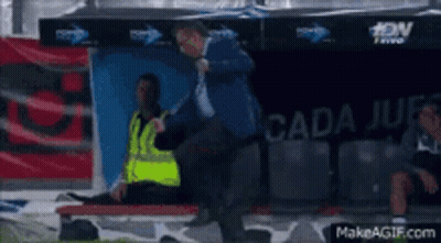 Soccer Player Laying On Stretcher In Dugout GIF