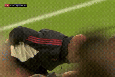 Soccer Player Lying On Field GIF