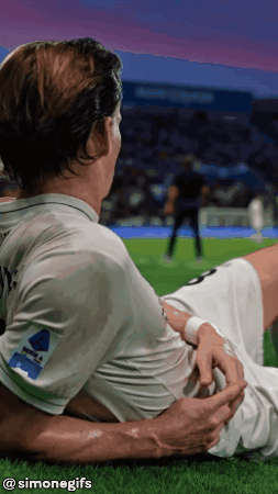 Soccer Player Lying On Grass Simonegifs GIF