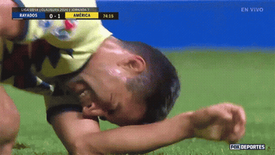 Soccer Player Lying On Ground GIF
