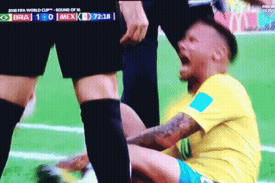 Soccer Player Lying On Ground With Mouth Open GIF