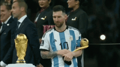 Soccer Player Number 10 Holding Trophy GIF