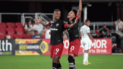 Soccer Player Number 12 Kicking Ball GIF