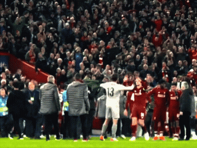 Soccer Player Number 13 Hugging Another Player GIF