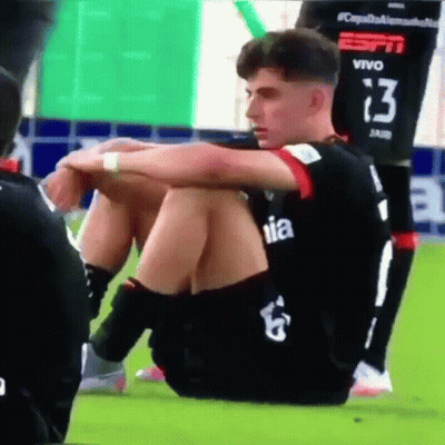 Soccer Player Number 13 Sitting On Ground GIF