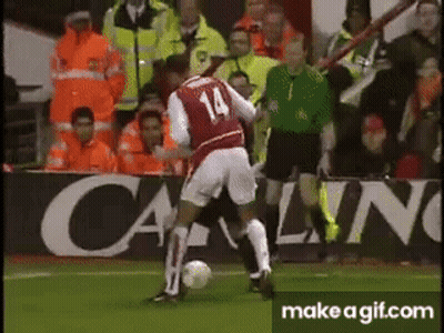 Soccer Player Number 14 Kicking Ball GIF