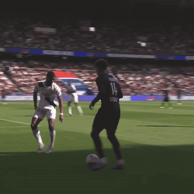 Soccer Player Number 14 Kicking Ball GIF