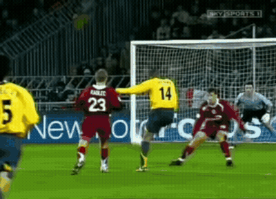 Soccer Player Number 14 Kicking Ball GIF