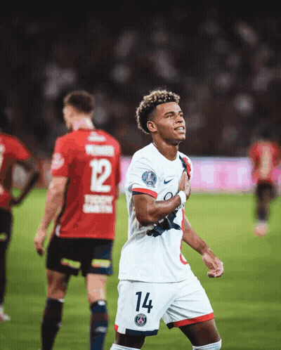 Soccer Player Number 14 On Field GIF