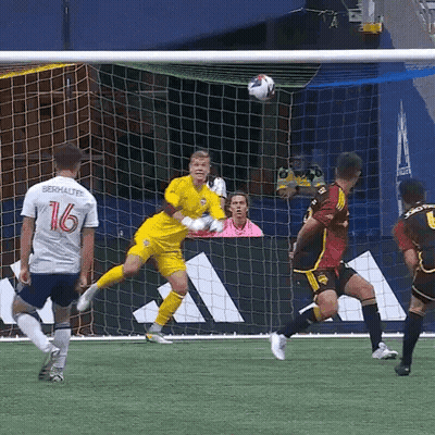 Soccer Player Number 16 Jumping For Ball GIF