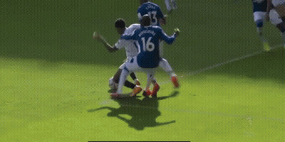 Soccer Player Number 16 Tackled GIF