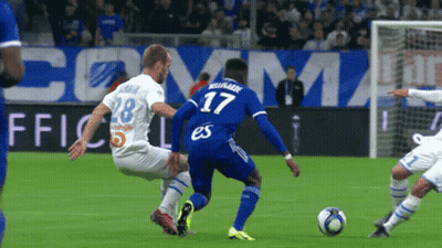 Soccer Player Number 17 Kicks Ball GIF