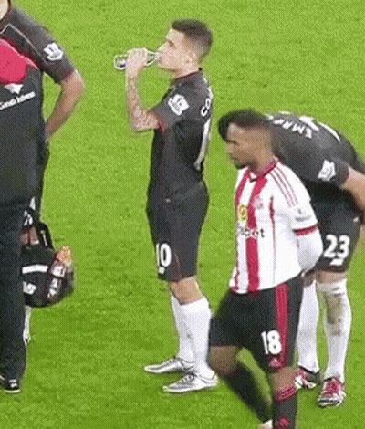 Soccer Player Number 18 Drinking From Bottle GIF